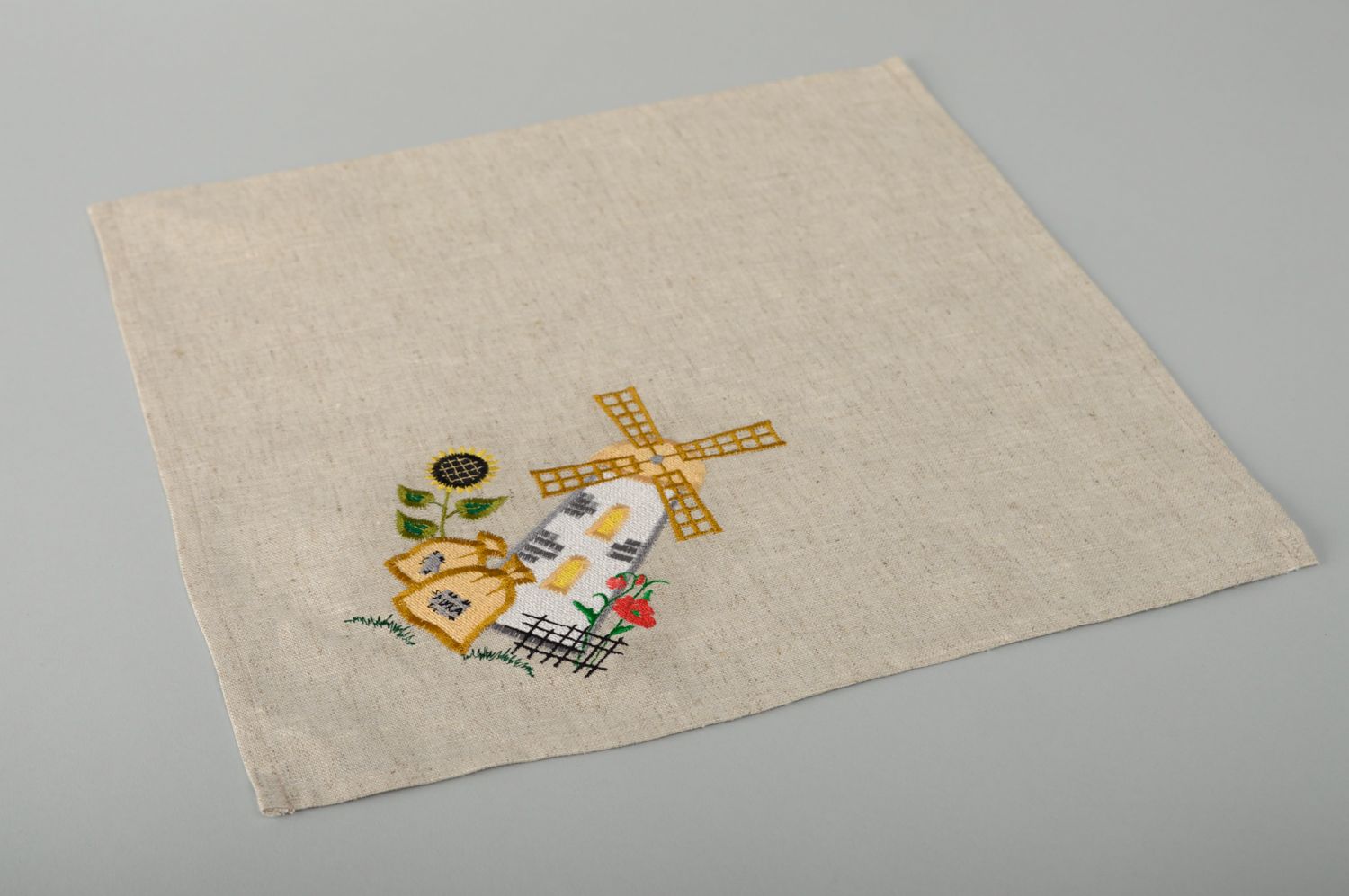 Handmade fabric napkin with applique work photo 1