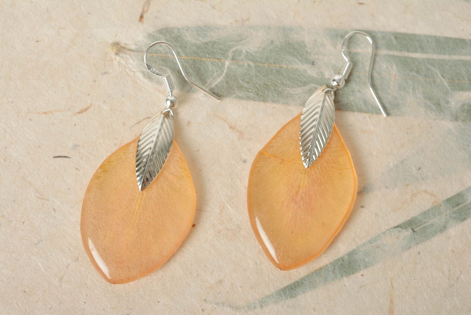 Elegant dangle earrings with orange flower petals in epoxy resin handmade photo 1