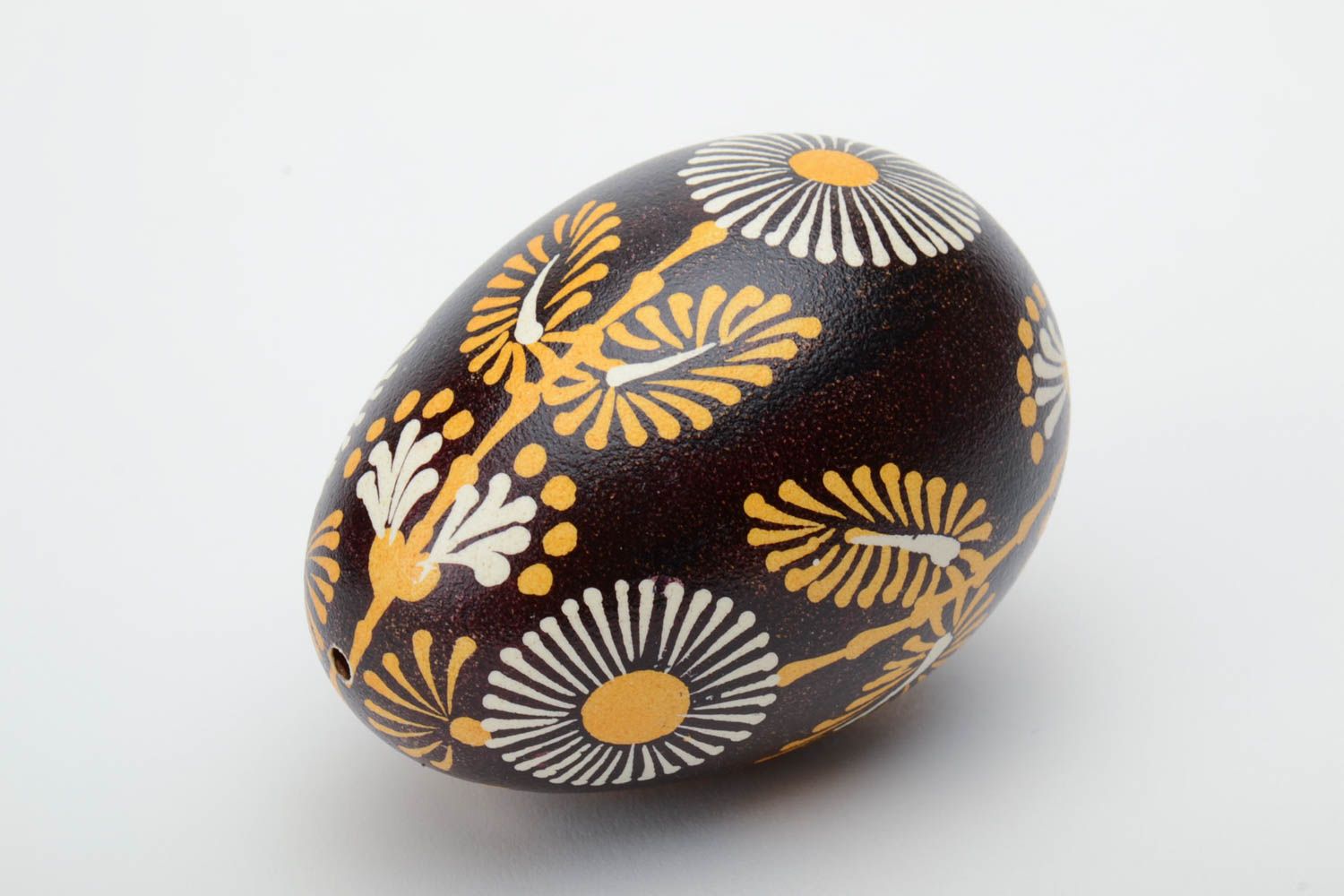 Handmade Lemkiv decorative Easter egg with bright flowers on black background photo 2