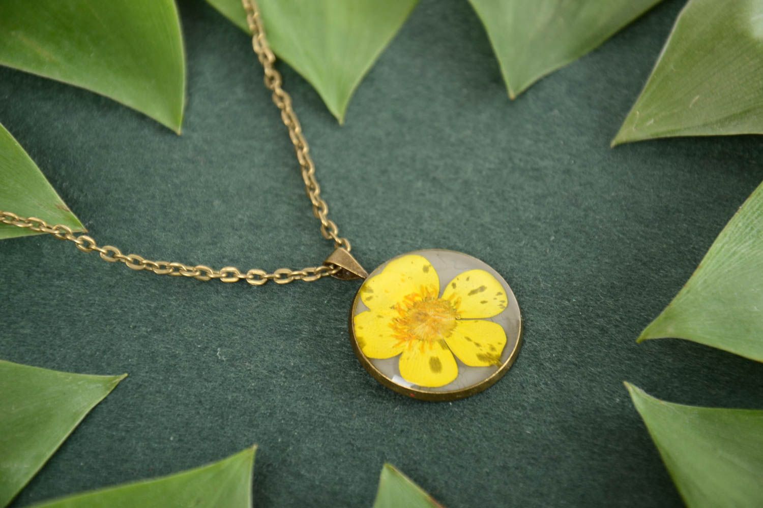 Handmade yellow round pendant necklace with dried flowers and epoxy resin photo 1