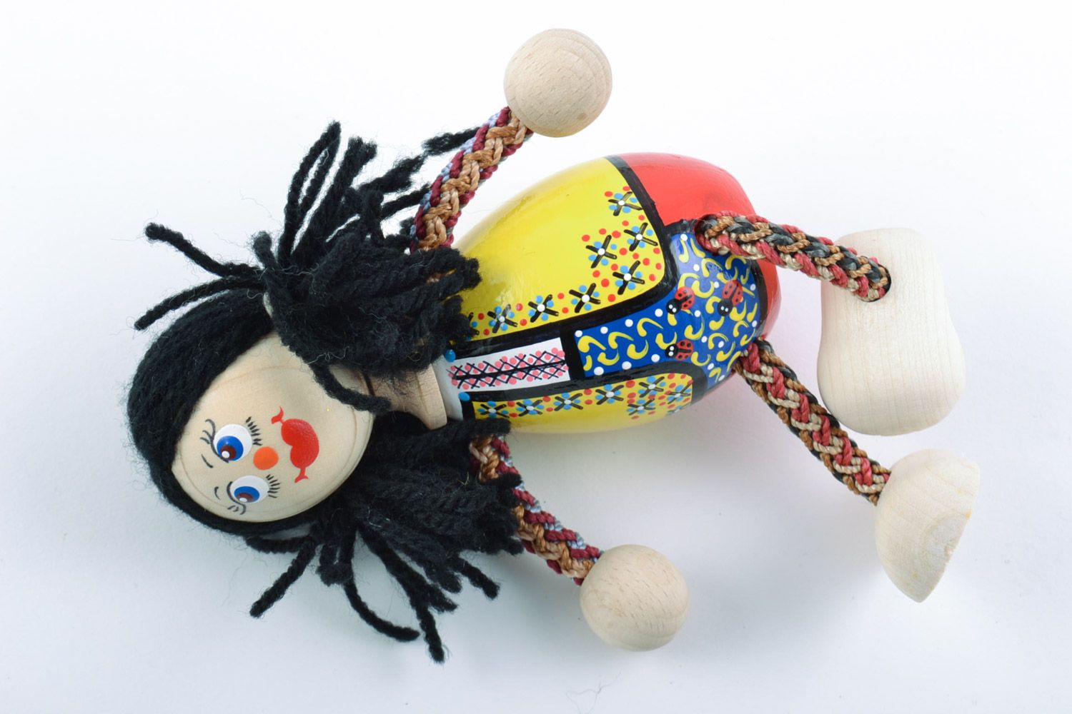 Juguete de madera muñeca de piernas de hilos infantil o para decorar artesanal foto 5