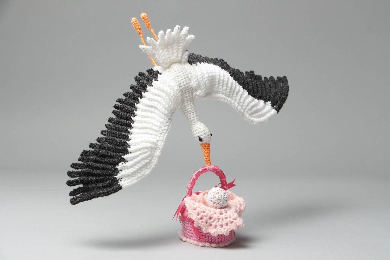 Small crochet toy Stork with Child photo 1