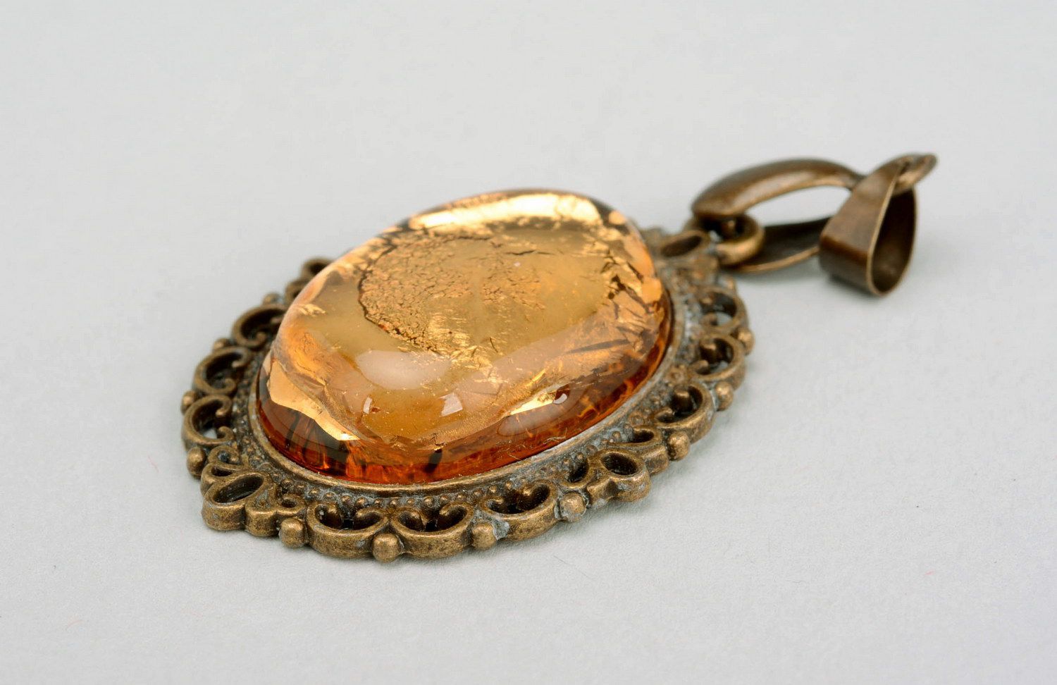 Vintage pendant with gilding photo 1