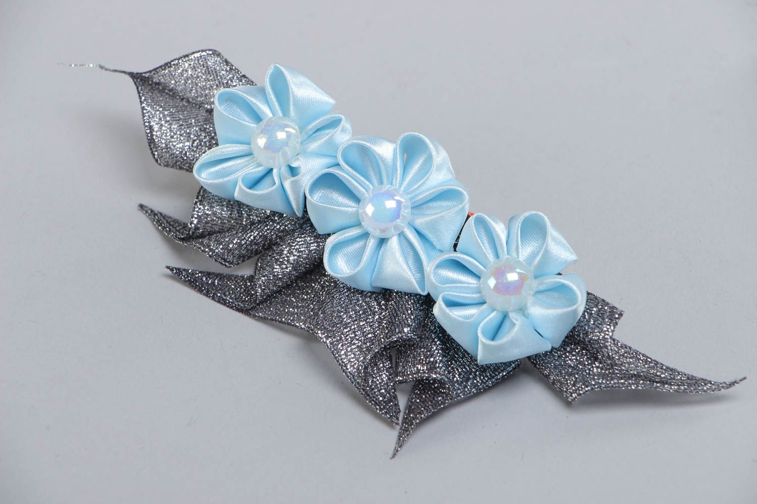 Handmade decorative hair clip with three blue satin ribbon kanzashi flowers photo 2