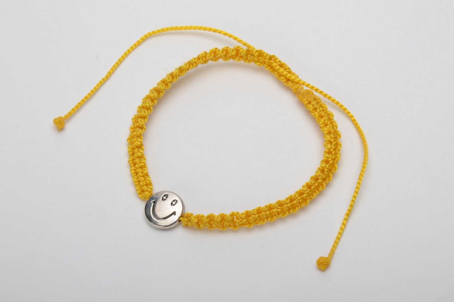 Handmade macrame woven women's wrist bracelet with metal charm smilie photo 3