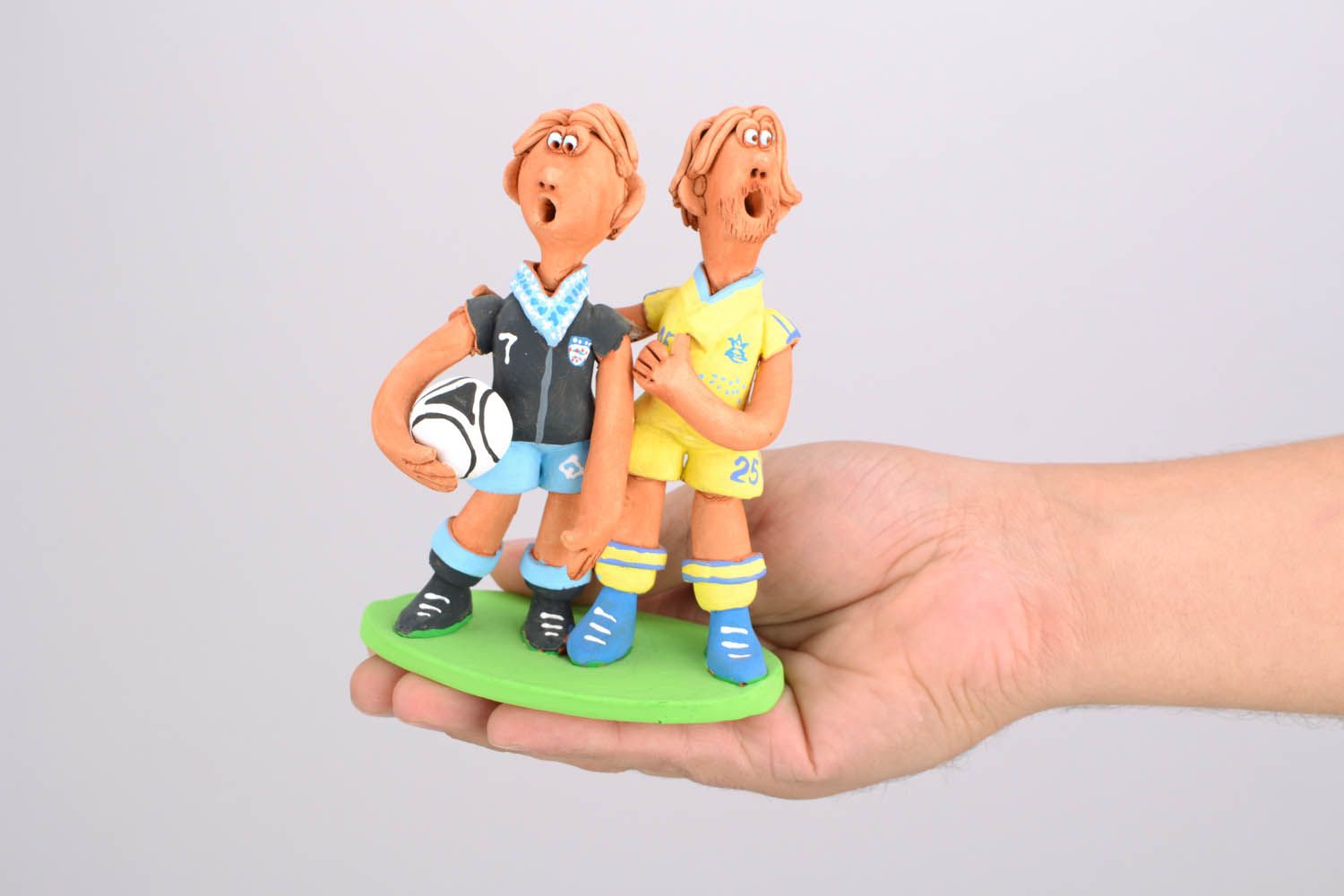 Figura de barro hechas a mano de jugadores de fútbol foto 2