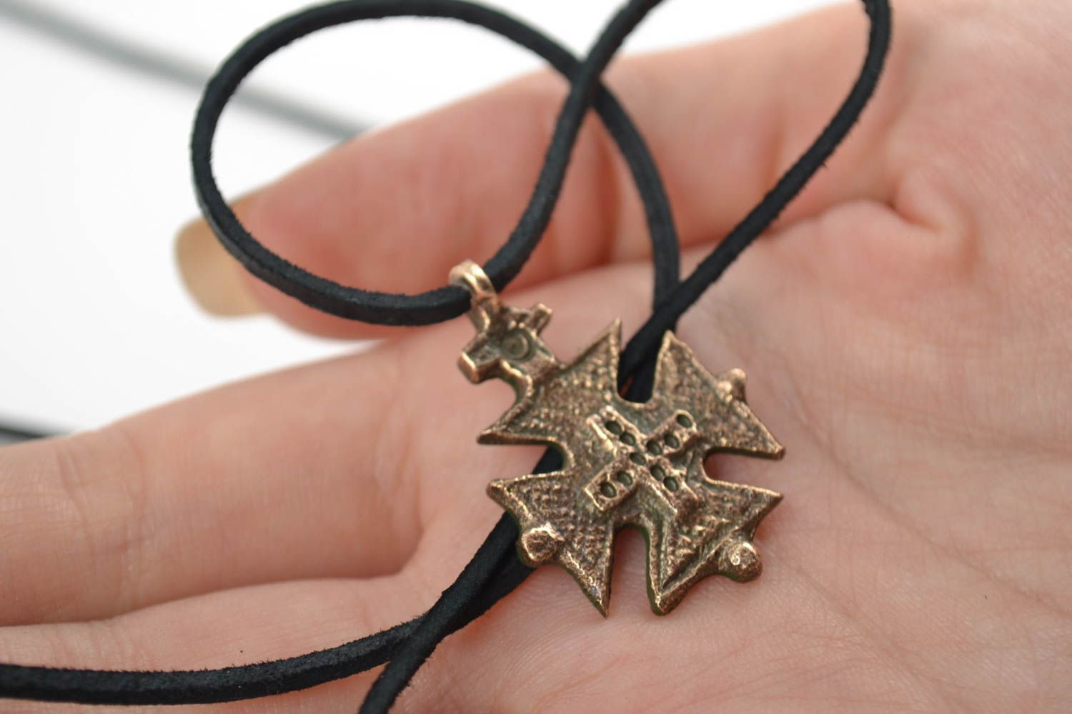 Handmade decorative small bronze next to skin cross pendant necklace on cord  photo 2