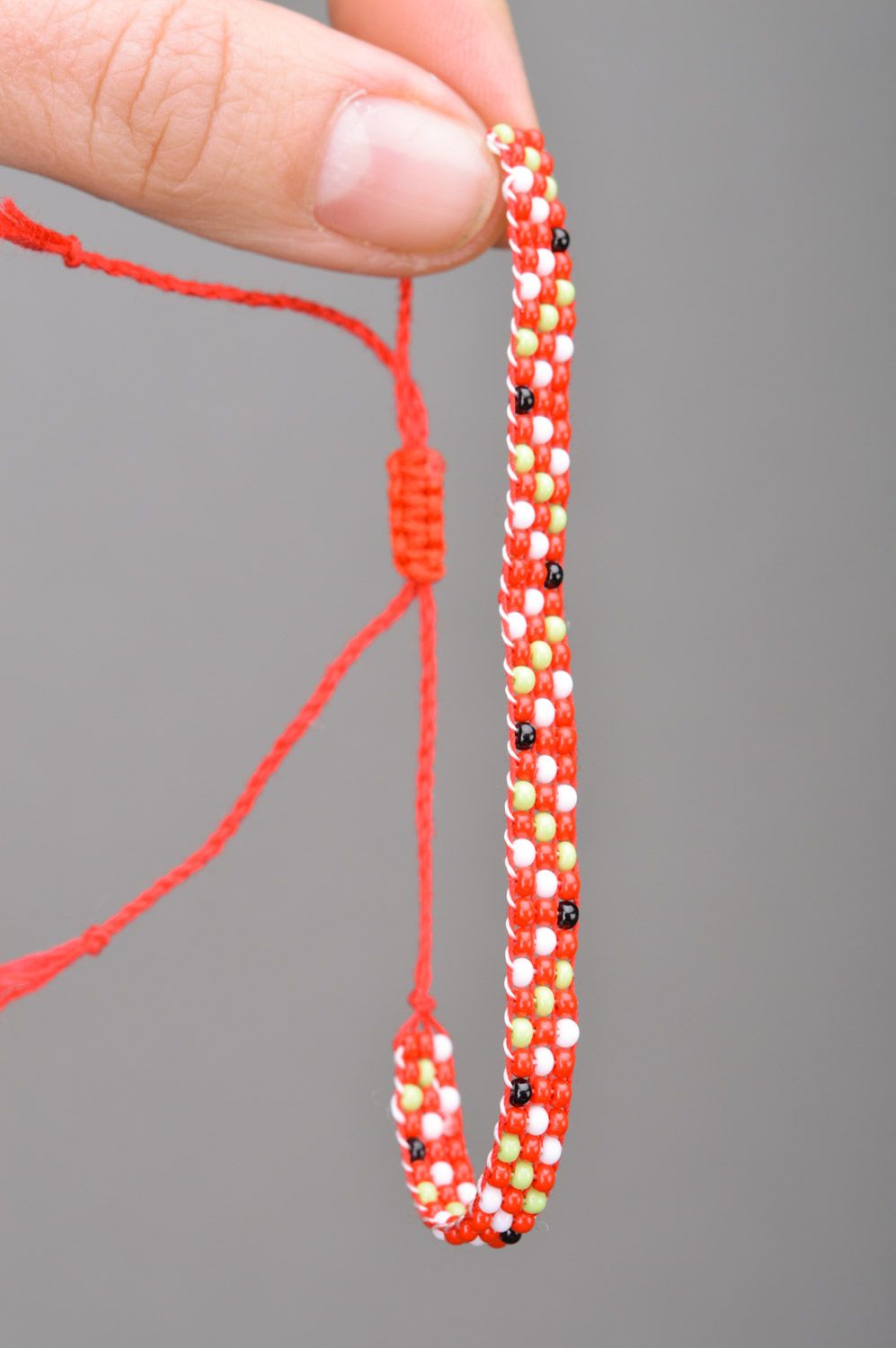 Bracelet fait main de perles de rocaille bariolé rouge blanc vert bijou photo 3
