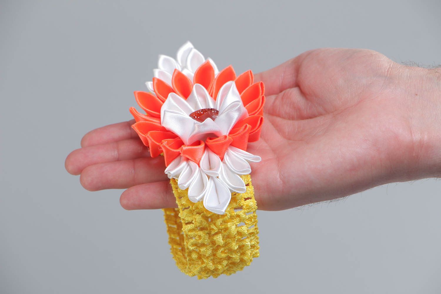 Handmade designer headband with yellow stretch basis and bright kanzashi flower photo 5