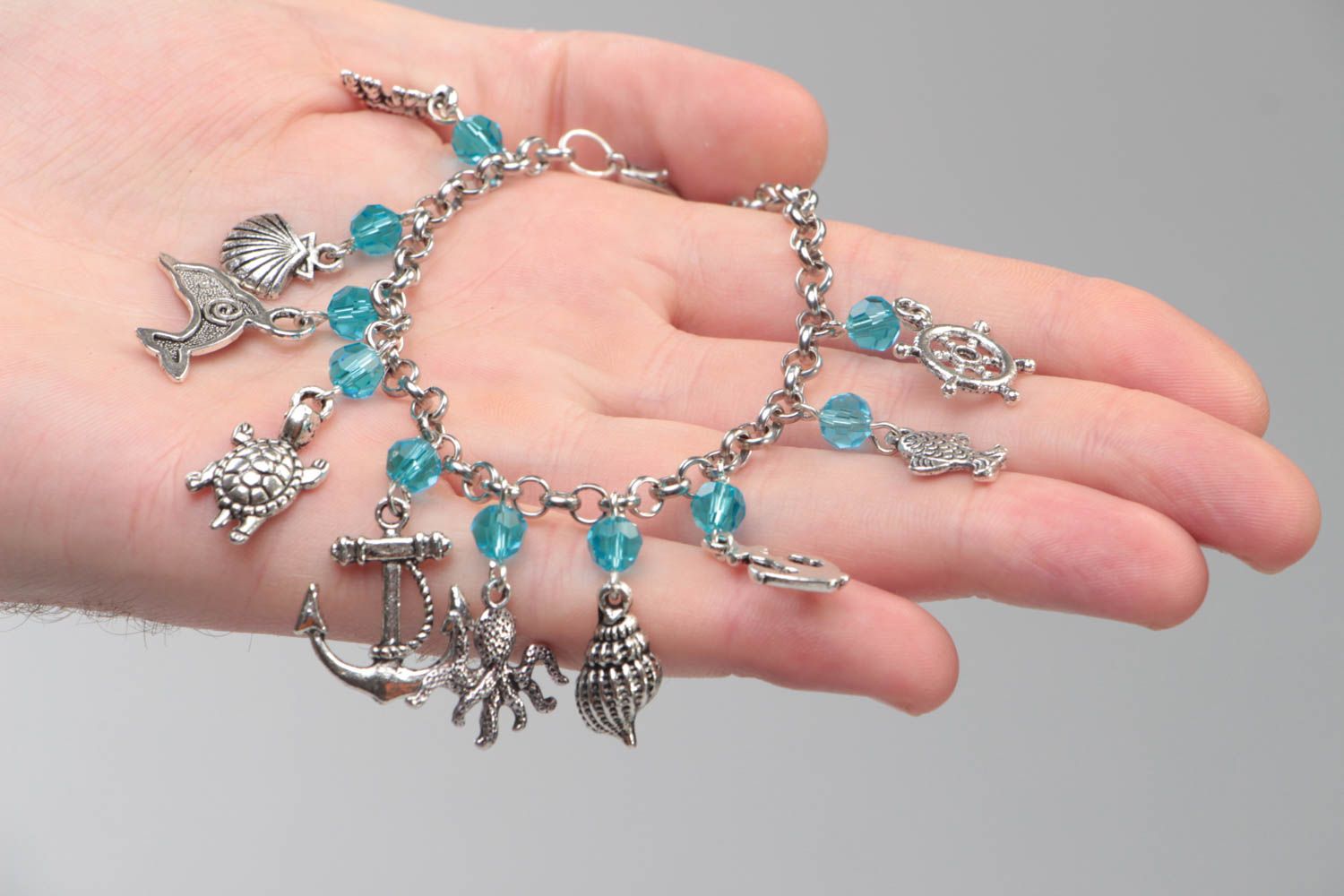 Handmade crystal bracelet accessory with metal charms stylish designer jewelry photo 5