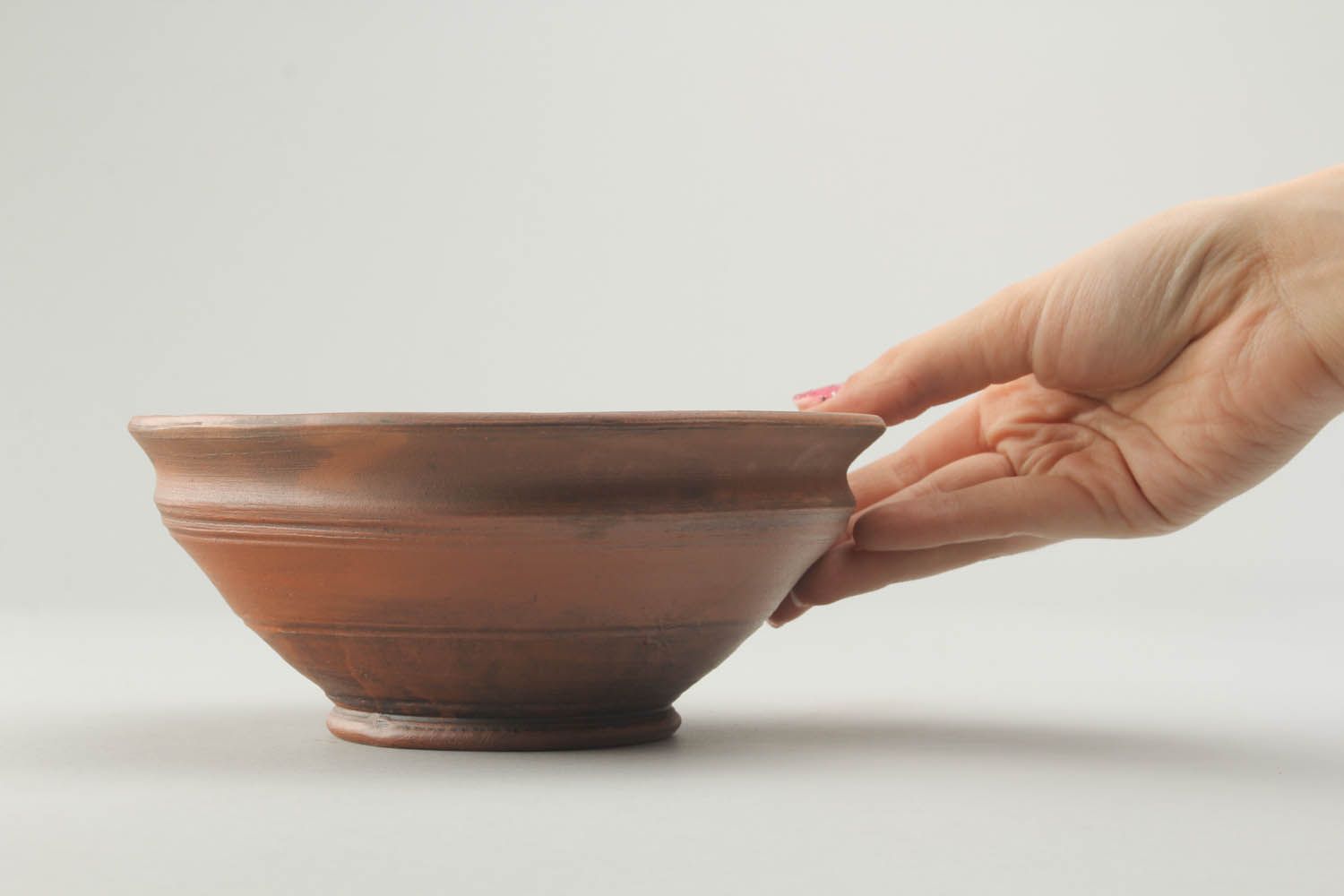 Bowl made of clay photo 3