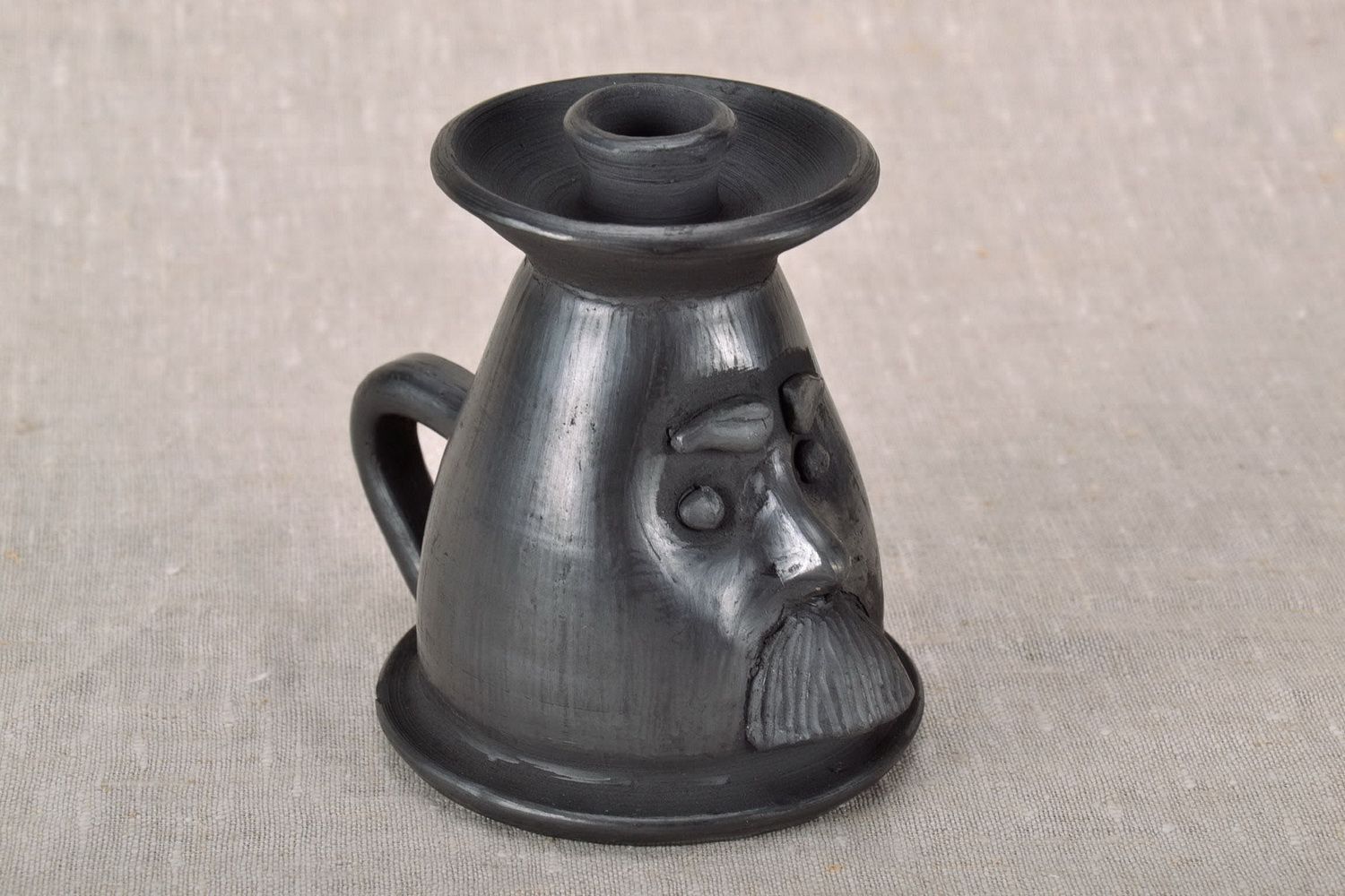 Clay candlestick Old man photo 1