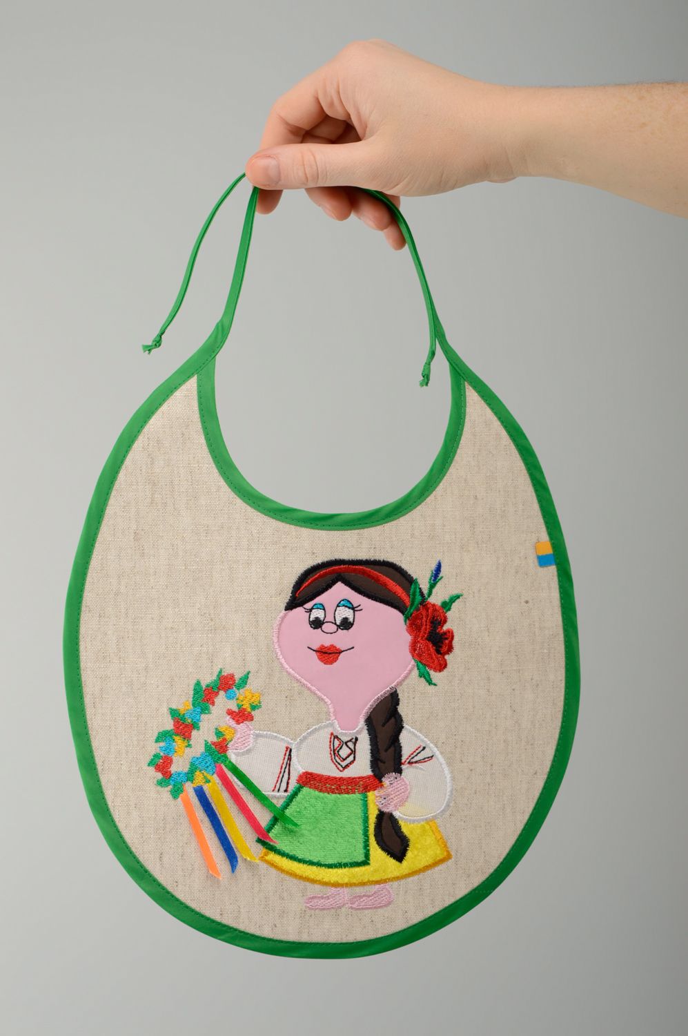 Handmade linen children's bib with embroidery for girls photo 4