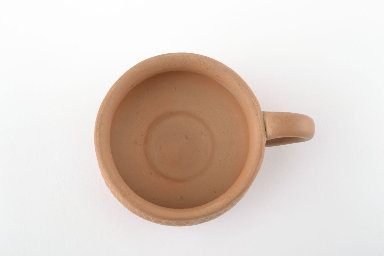 Light wide low clay not glazed coffee cup with handle and simple pattern photo 4