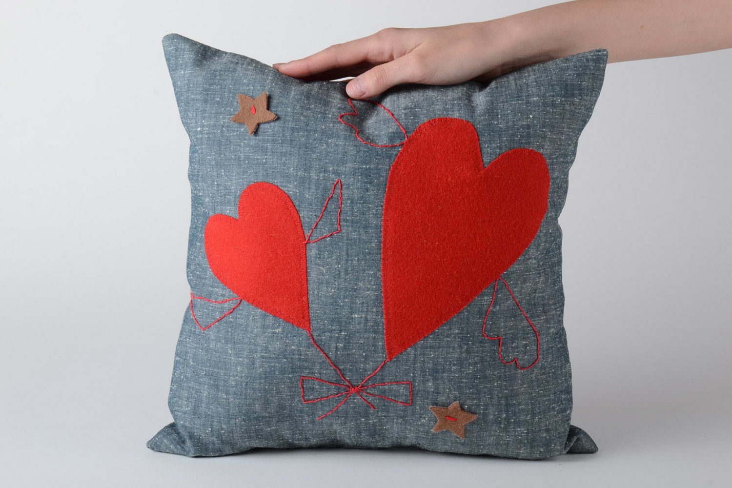 Handmade interior designer grey sofa cushion with heart-shaped applique  photo 5