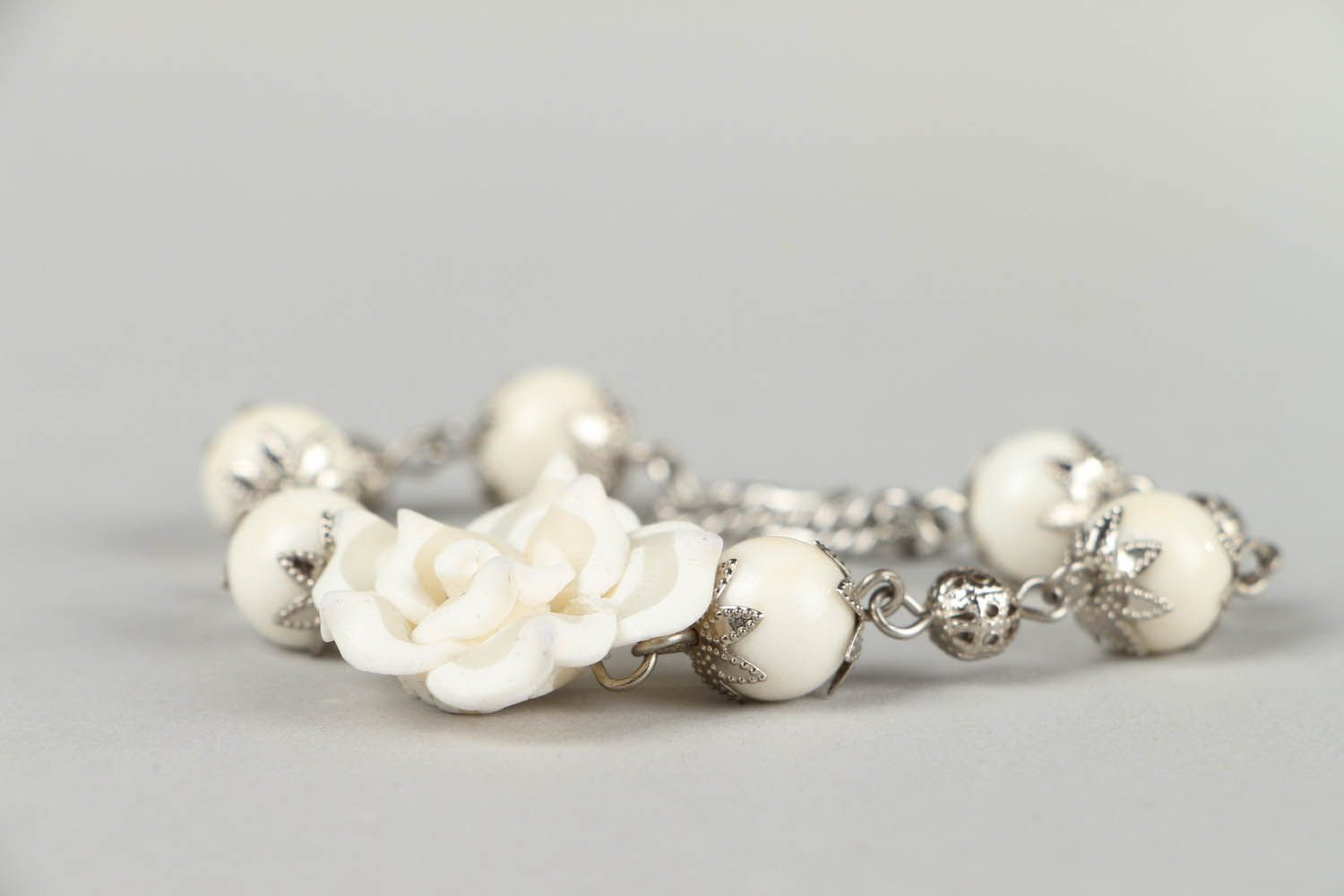 Bracelet with white flower photo 3