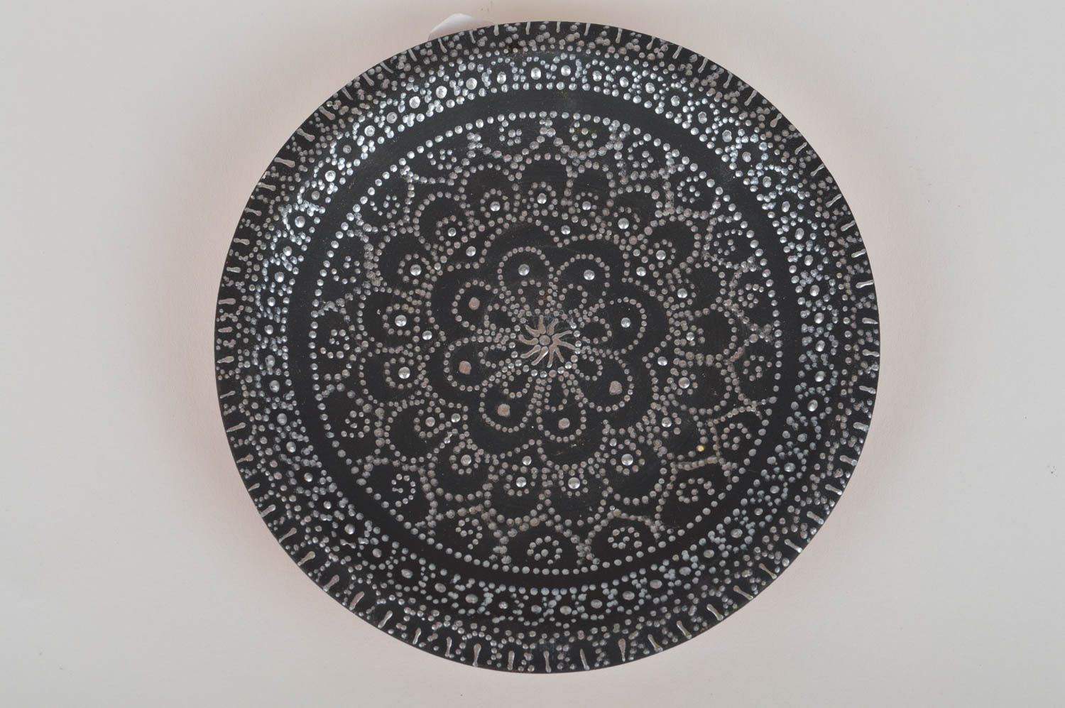 Handmade decorative ceramic wall plate black and white ornamented with acrylics photo 2