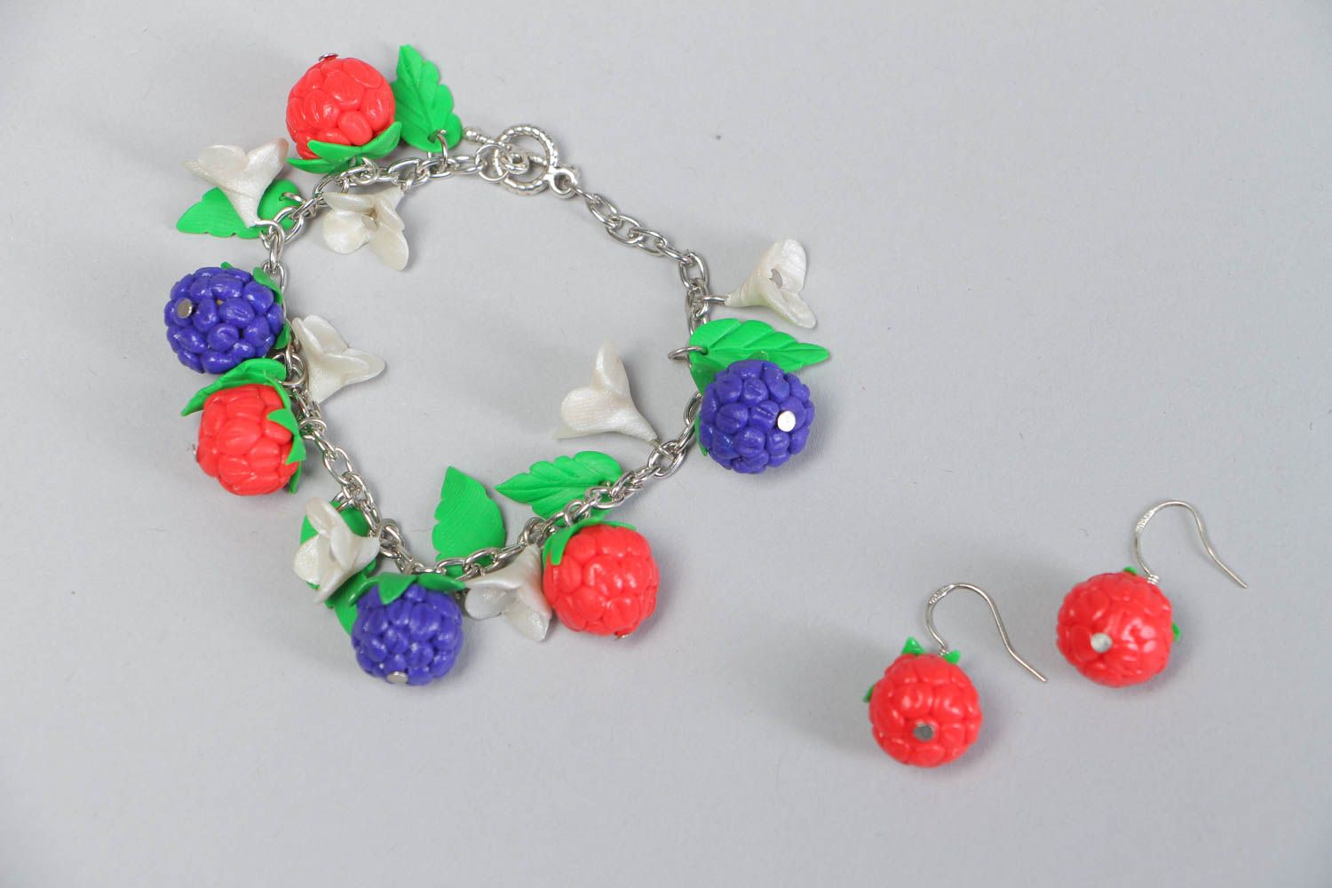 Set of handmade accessories jewelry made of clay cute bracelet and earrings photo 2