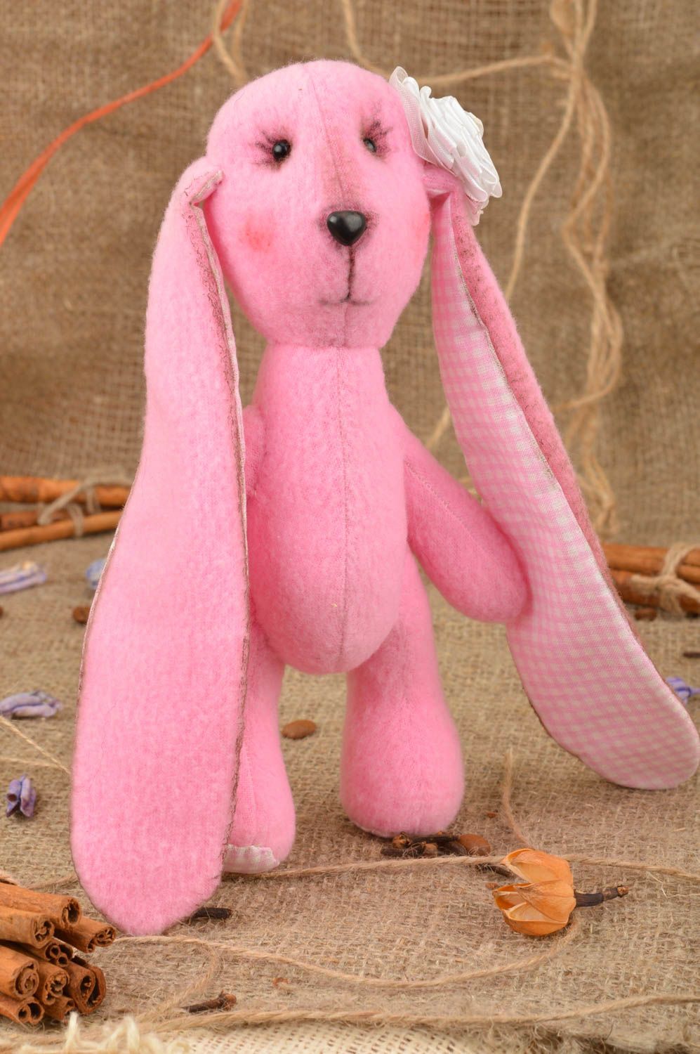 Handmade designer soft toy sewn of fleece and cotton pink rabbit with long ears photo 1