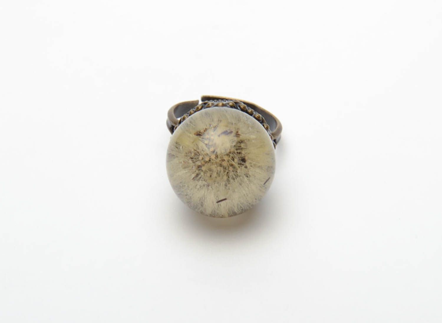 Bronze ring with natural dandelion in epoxy resin photo 5