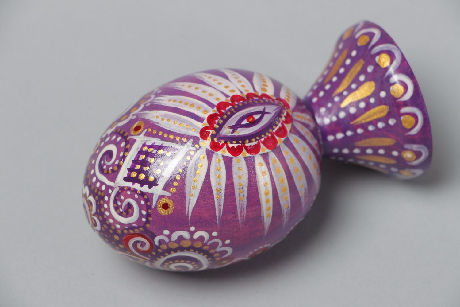 Handmade painted wooden Easter egg of lilac color in ethnic style photo 4
