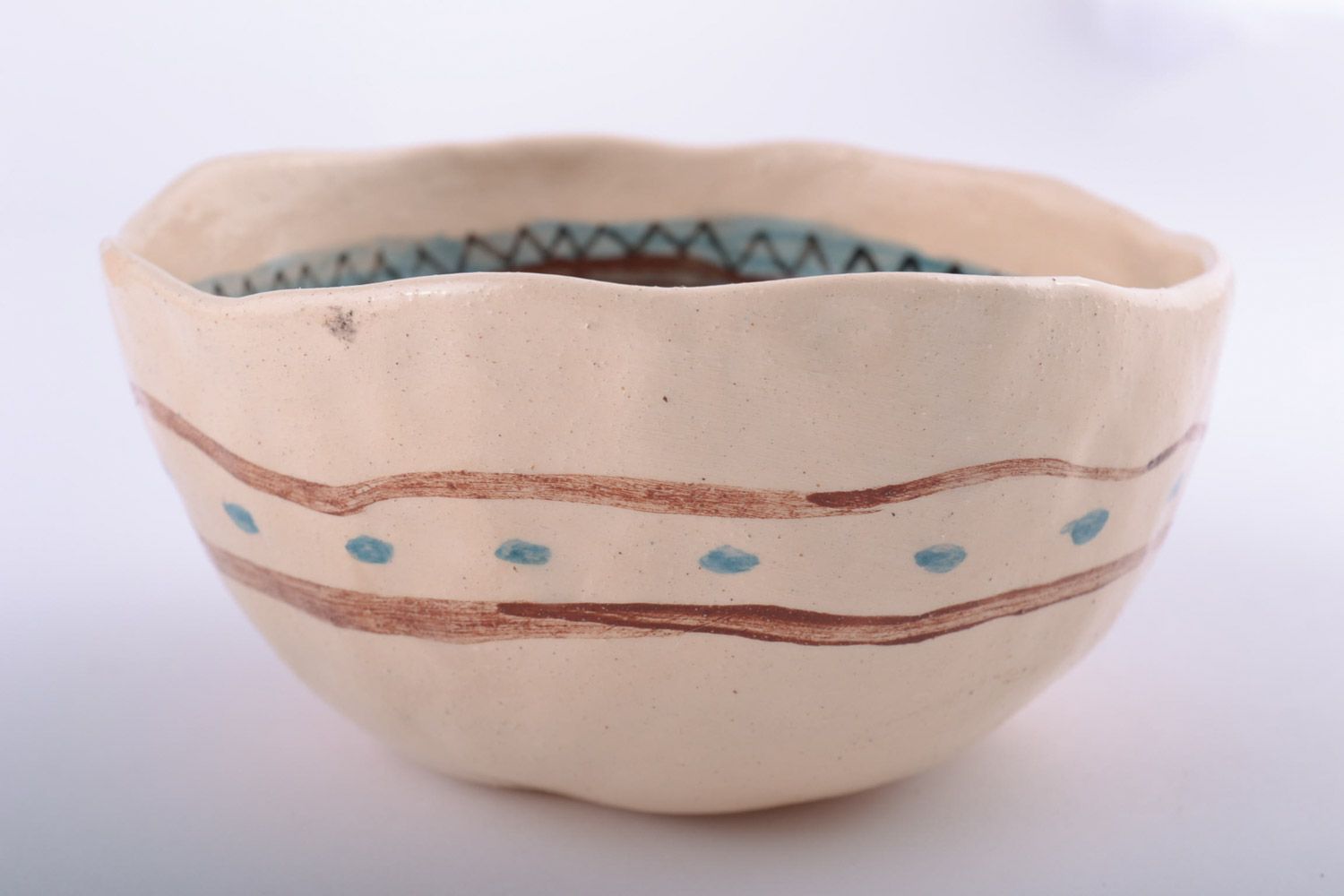 Small beige handmade clay bowl painted with engobes 0.25 l photo 4