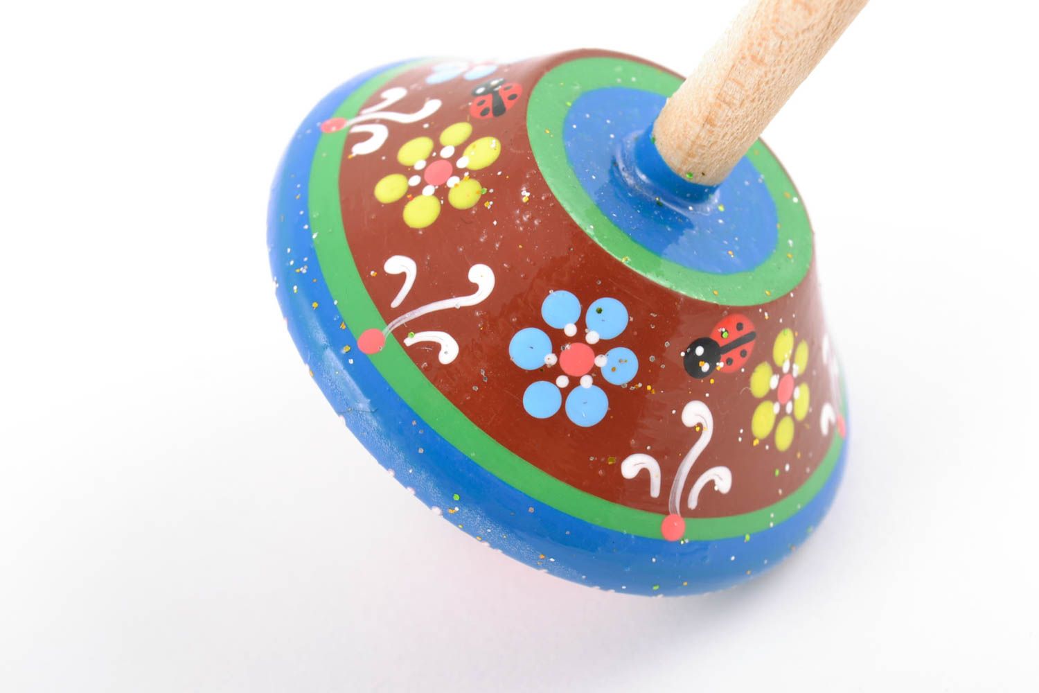 Petit jouet toupie avec peinture de couleurs écologiques fait main en bois photo 5