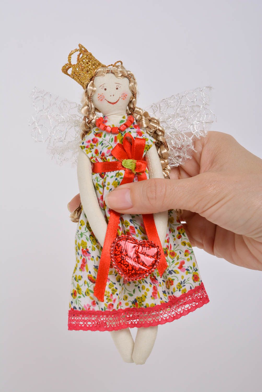 Handmade designer fabric soft doll princess in bright dress with floral pattern photo 4