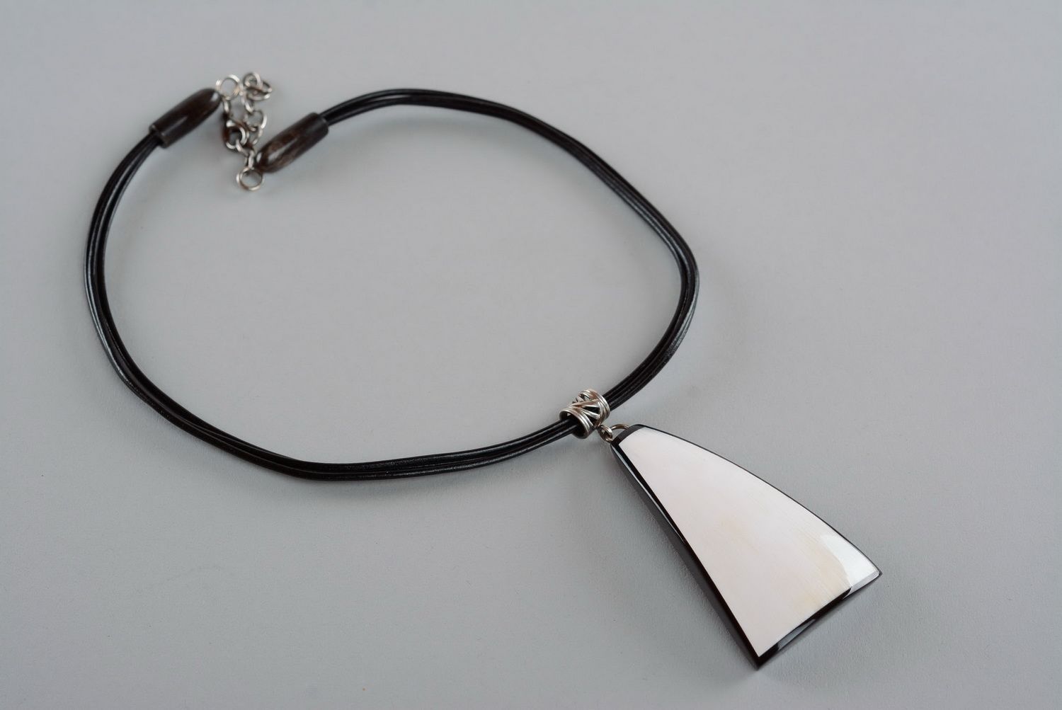Pendant made of natural cow horn photo 4