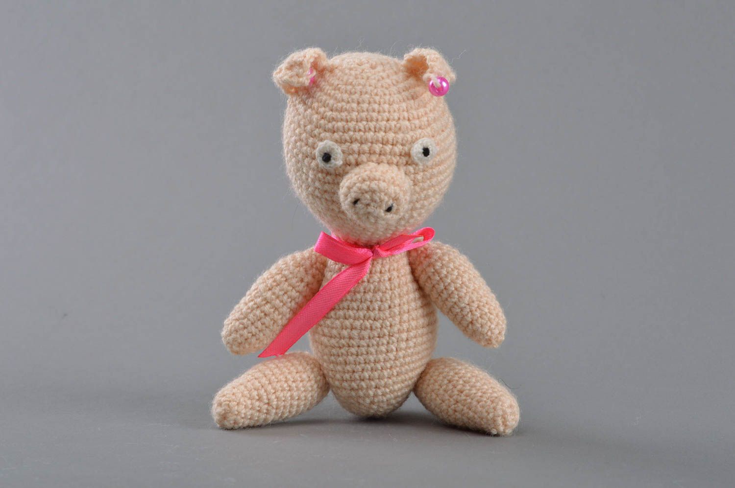 Soft crocheted toy pig with a bow of beige color handmade home decor photo 1