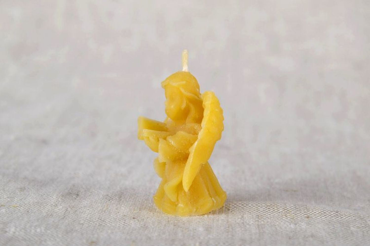 Candle made of natural wax Angel photo 2