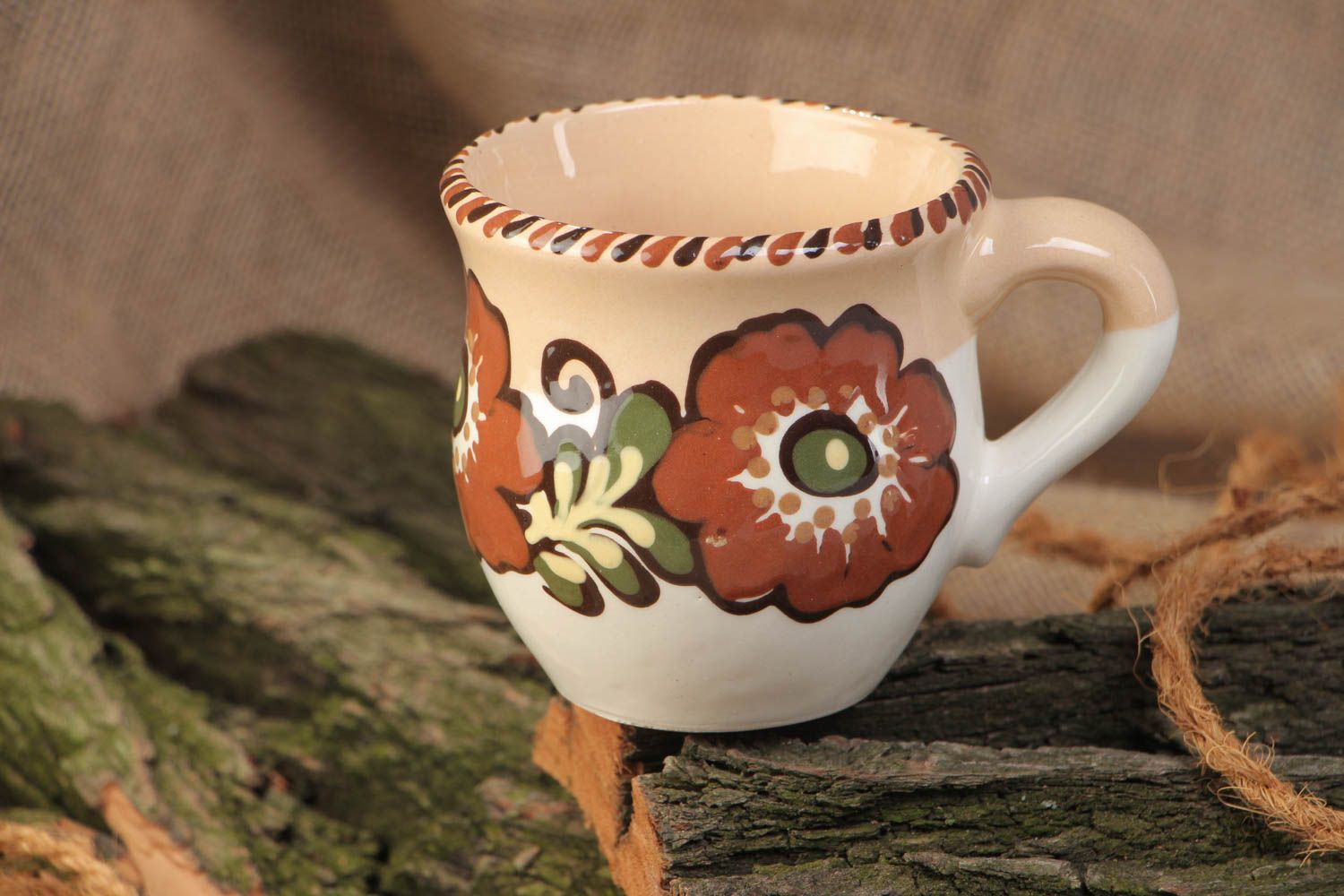 8 oz clay glazed coffee cup with handle and brown flower pattern photo 1