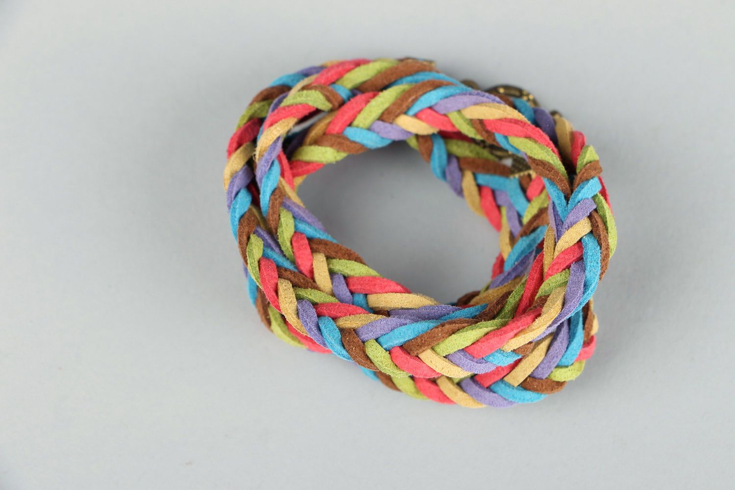 Bright braided bracelet made of suede photo 2