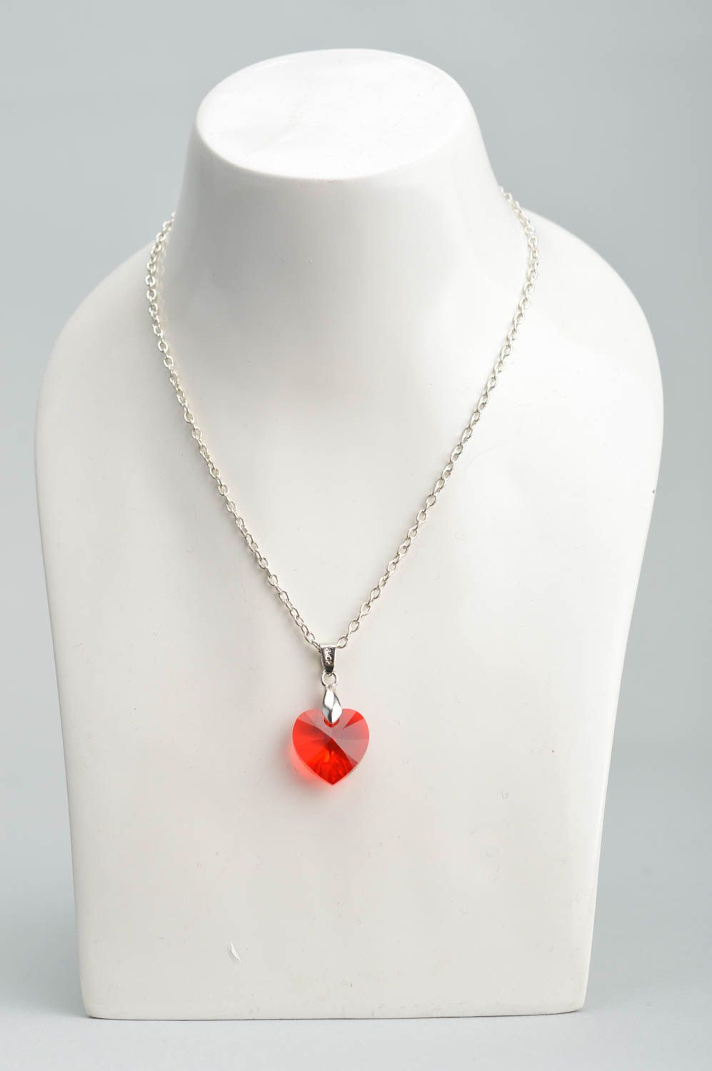 Beautiful designer pendant in shape of heart with crystal of red color on chain  photo 5
