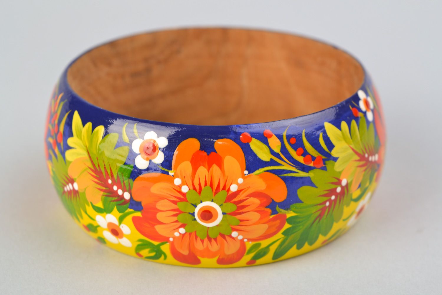 Handmade wooden wrist bracelet with traditional Petrikivka painting photo 4