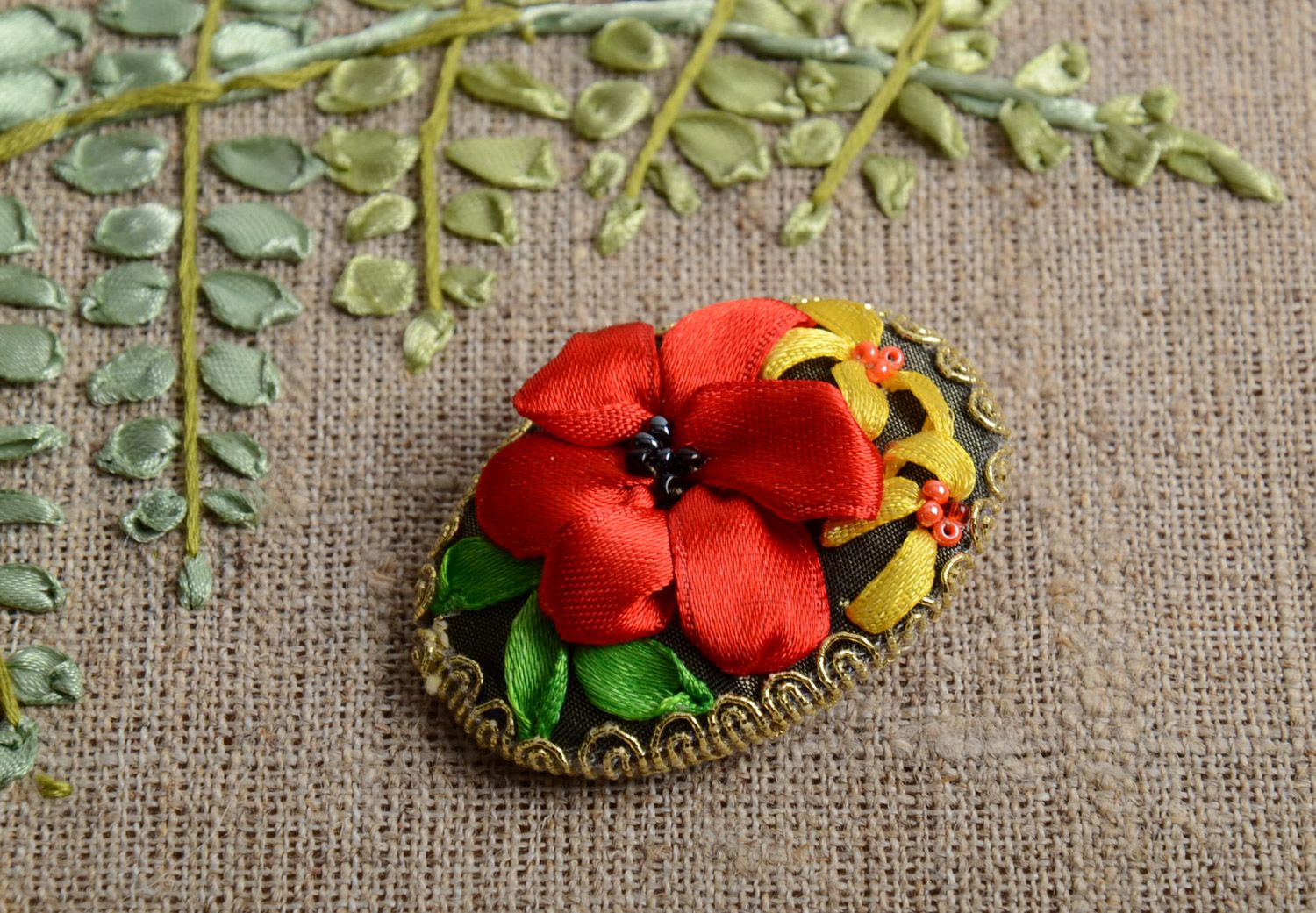 Handmade brooch with ribbon embroidery on flax base black with red photo 1