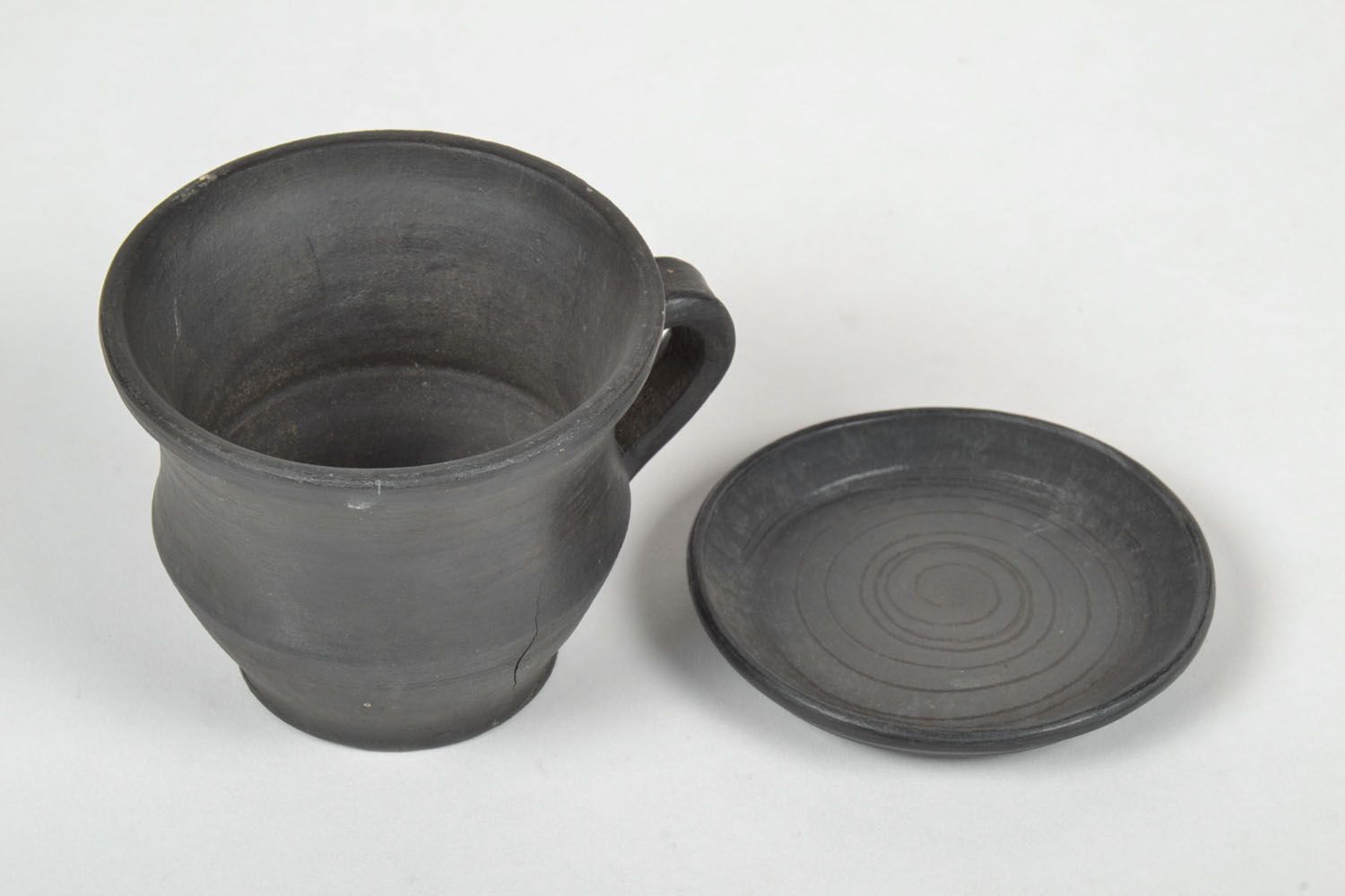 Black clay not glazed coffee cup with handle and saucer photo 3