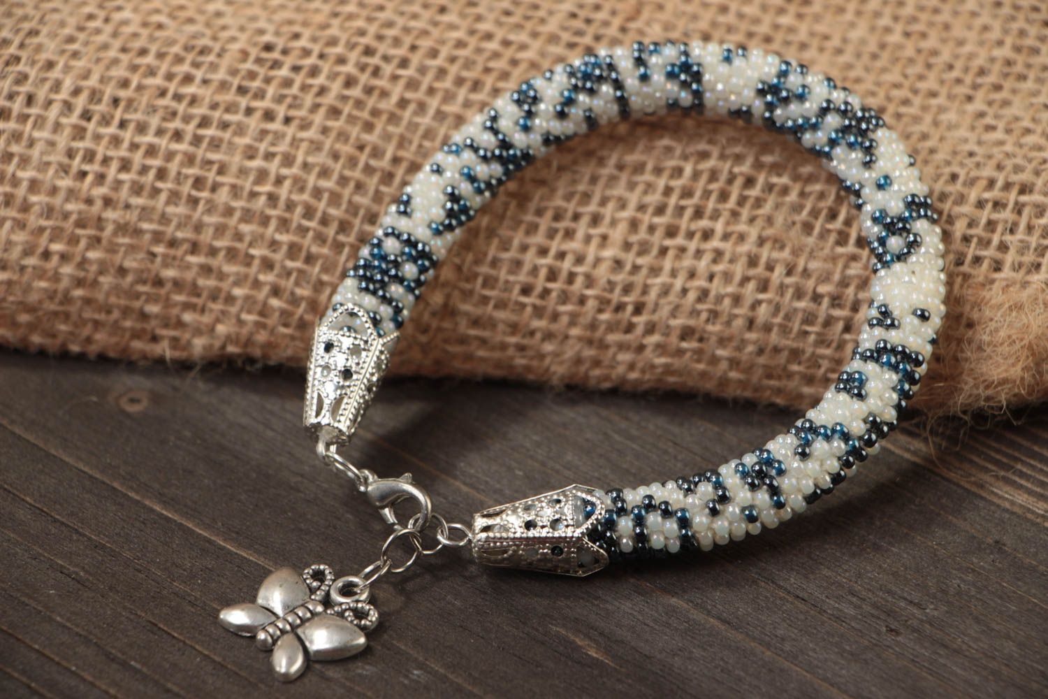 Beautiful handmade beaded cord bracelet with metal charm Butterfly photo 1