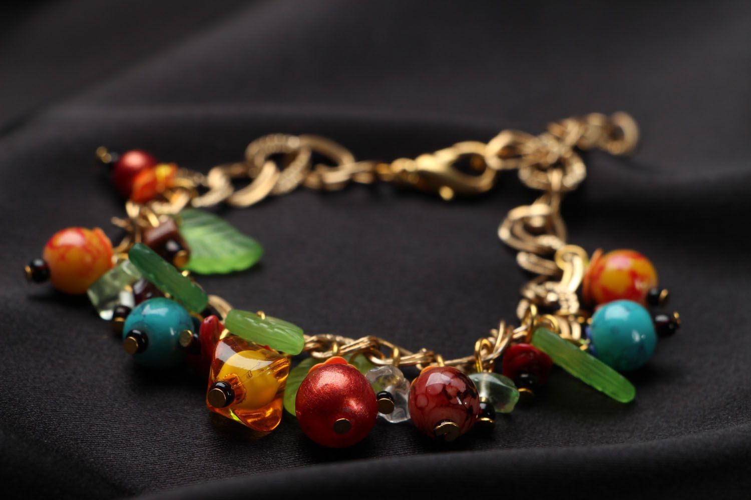 Handmade bracelet with charms photo 2