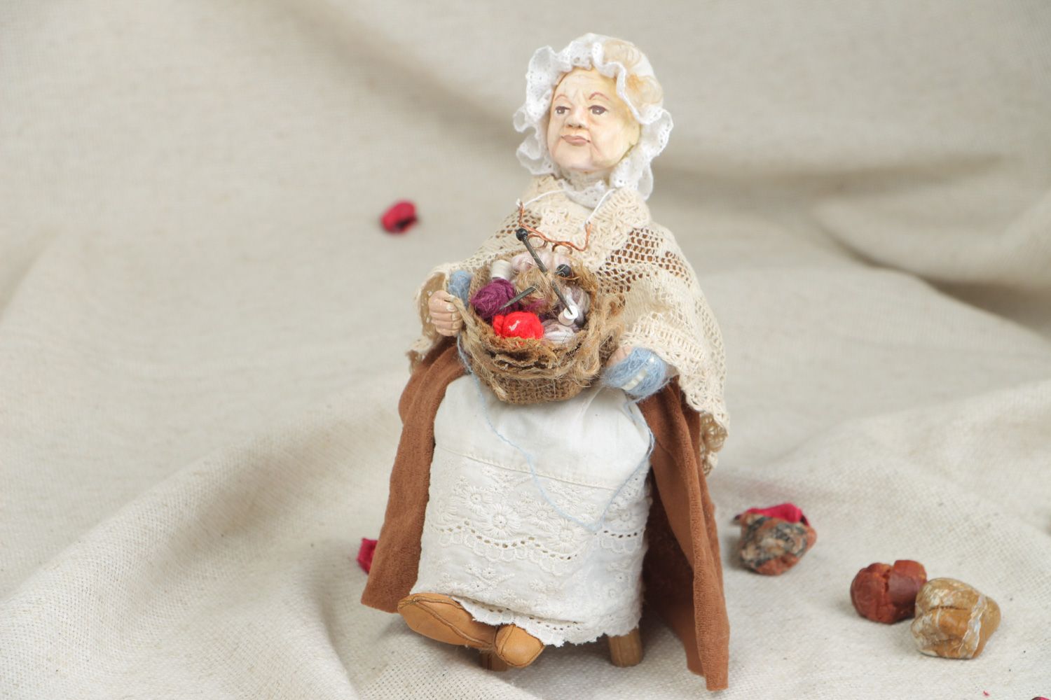 Handmade figurine molded of clay Granny in bonnet sitting in wooden arm chair photo 5