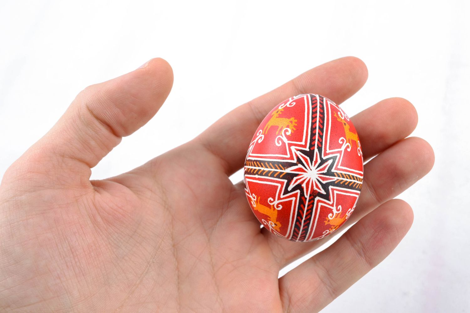 Handmade Easter egg painted in red color palette photo 2
