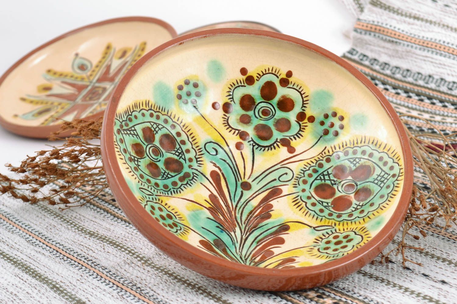 Beautiful handmade clay patterned wall plate painted with glaze photo 1
