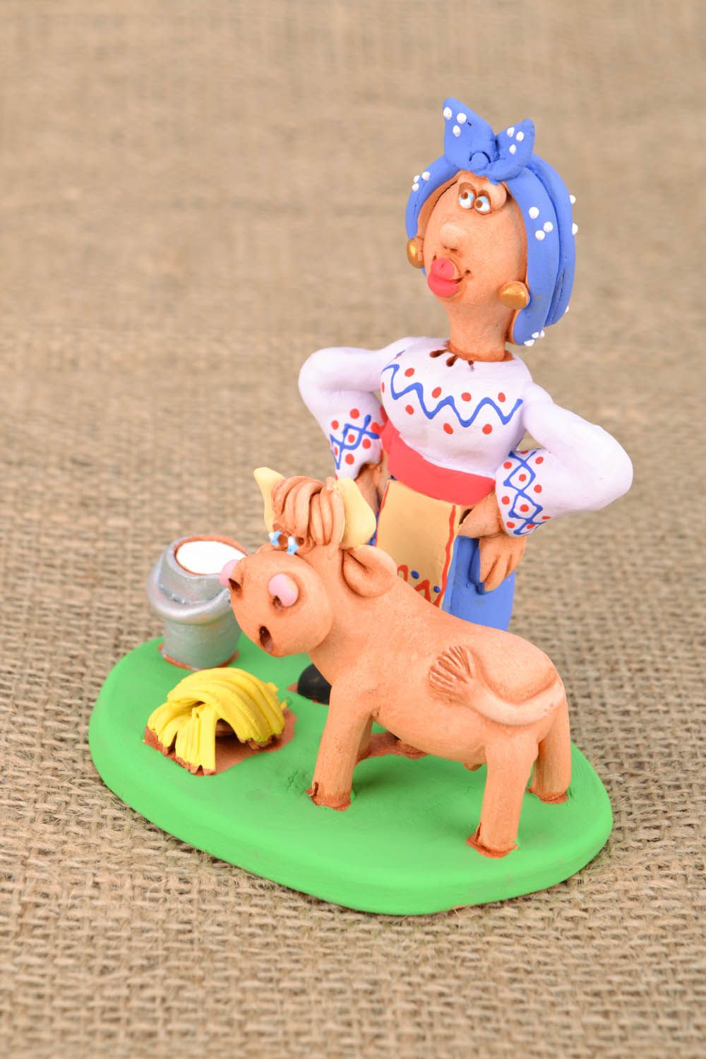 Homemade ceramic figurine The Cossack Woman Milking a Cow photo 1