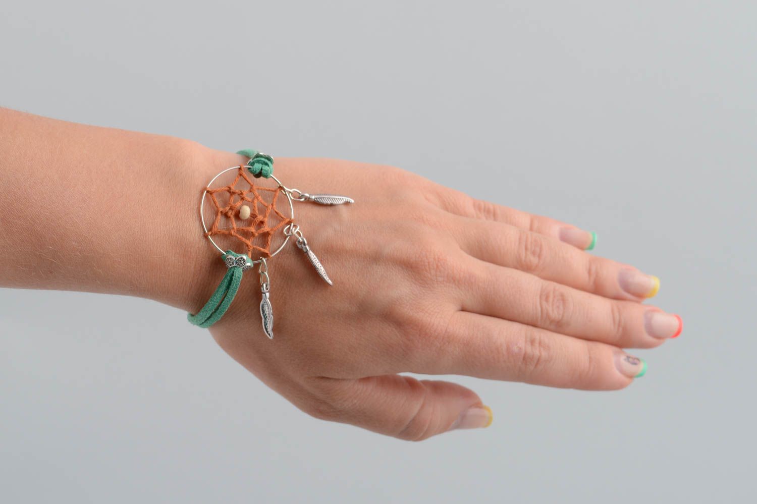 Handmade green faux cord wrist bracelet with metal charms dreamcatcher amulet photo 5