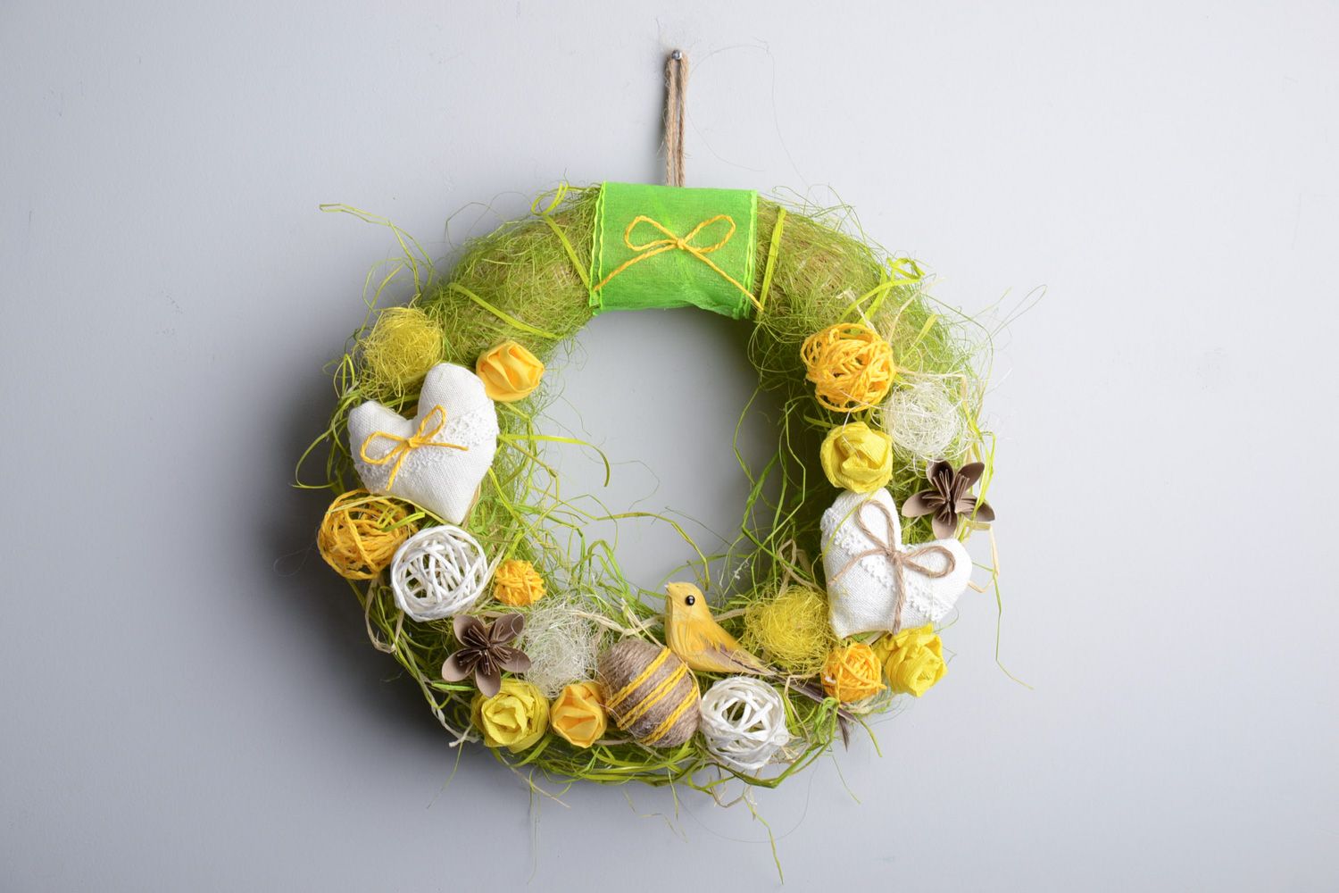 Handmade Easter door wreath with eggs and birds for interior decoration photo 1