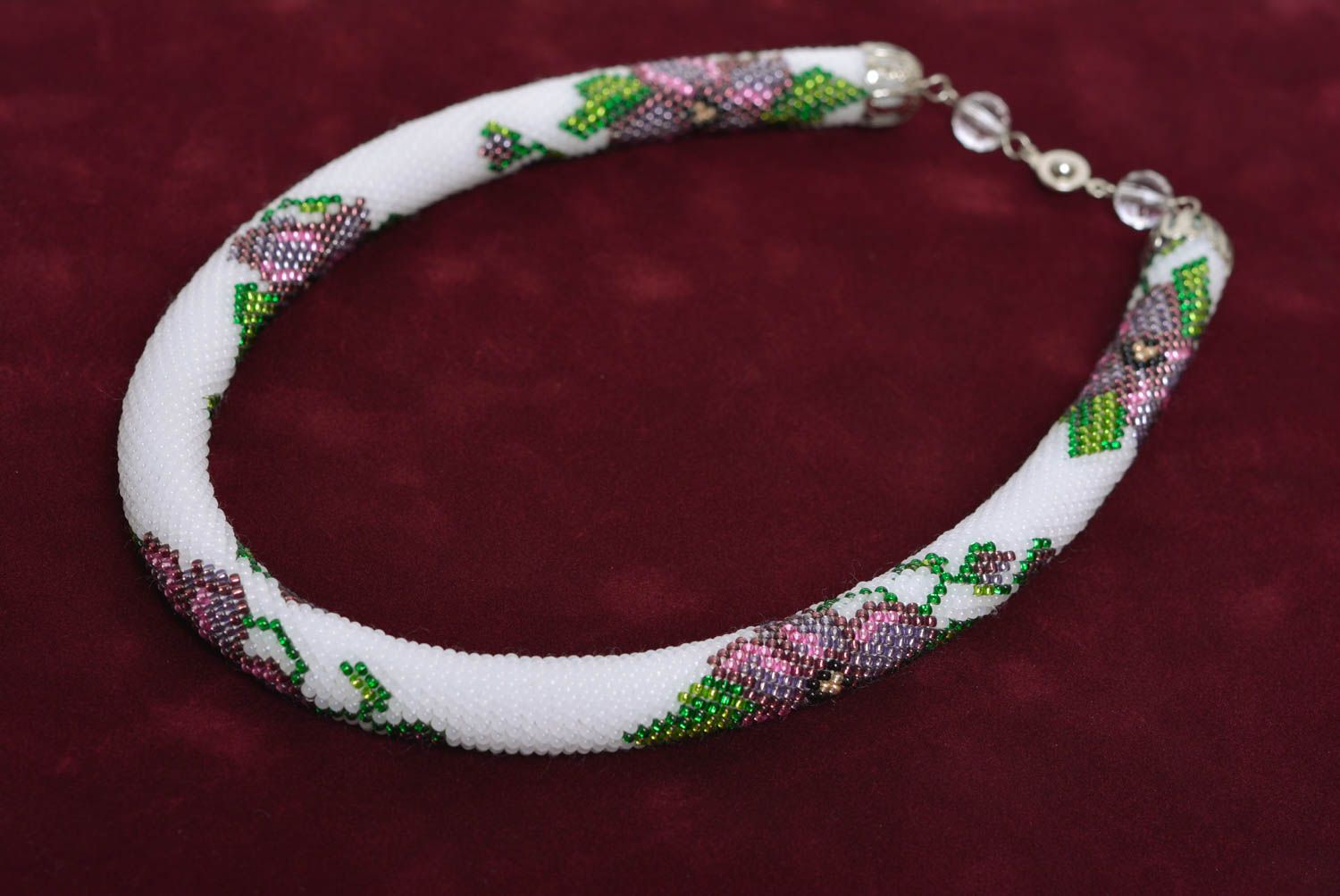 Beautiful handmade design woven beaded cord necklace white with floral ornament photo 1