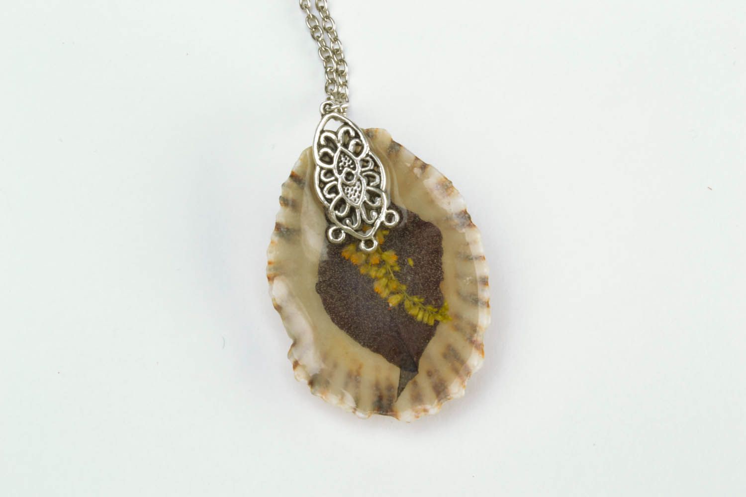Pendant in the form of a shell photo 4