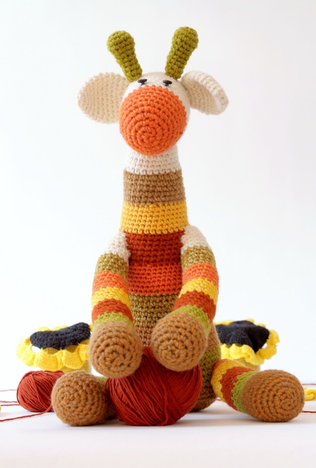 Jouet mou tricoté en forme de girafe photo 1