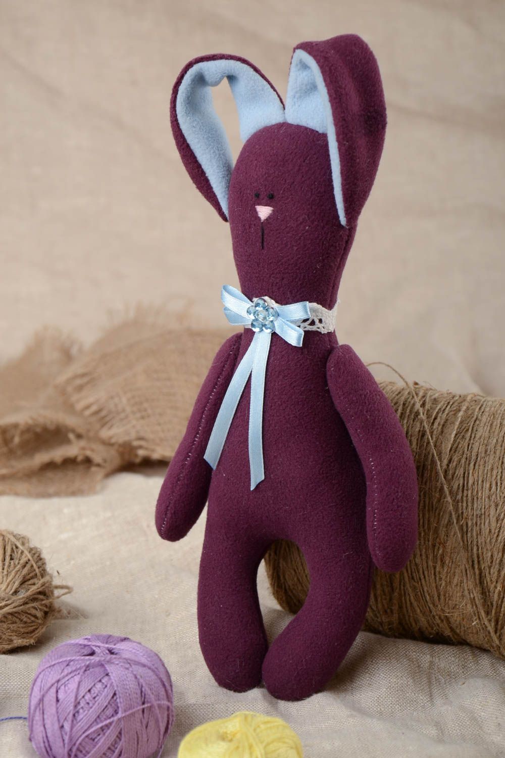 Handmade designer soft toy sewn of fleece violet rabbit with long ears photo 1
