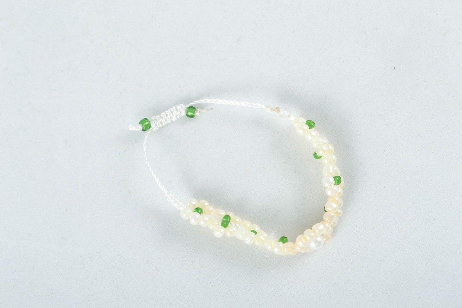 Handmade white and light green beads' white cord strand bracelet photo 3
